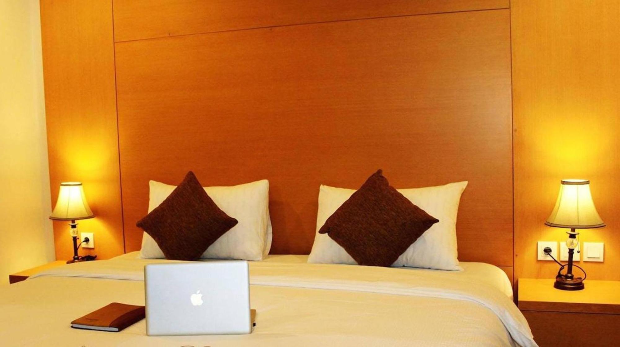 Grand Asia Hotel Makasar Pokoj fotografie